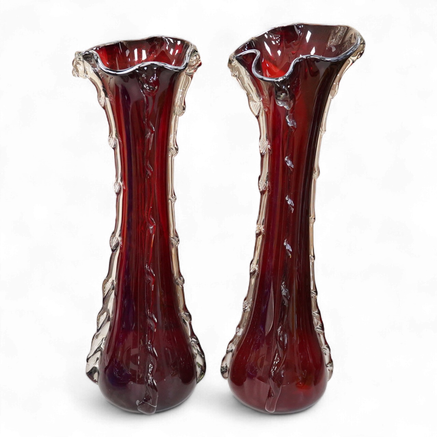 A pair of tall ruby and clear glass vases, 51cm high